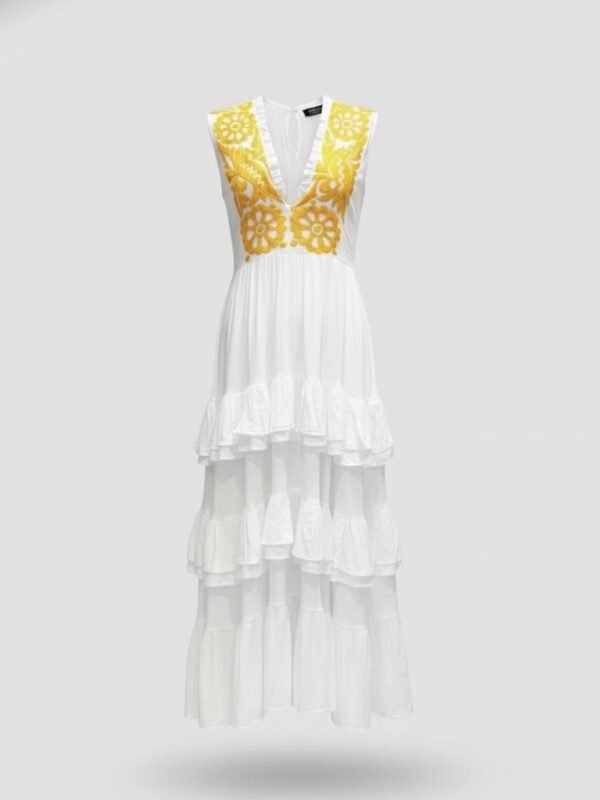 Vestido de novia artesanal blanco con bordado dorado hecho a mano por artesanas de jalapa de diaz en pechera